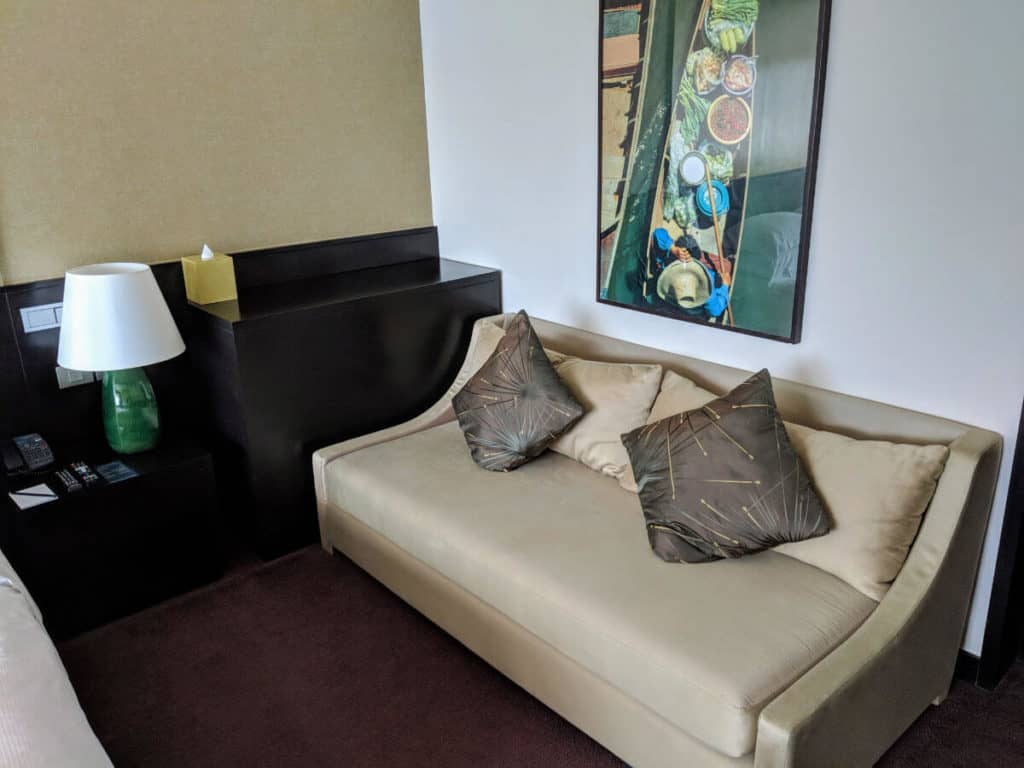 Millennium Hilton Bangkok - worn-out sofa for extra guests