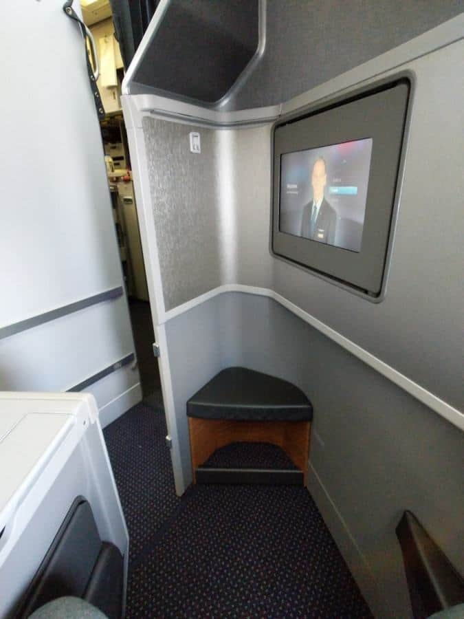 American Airlines 777-200 Business Class, front view of the seat. Note the galley nearby