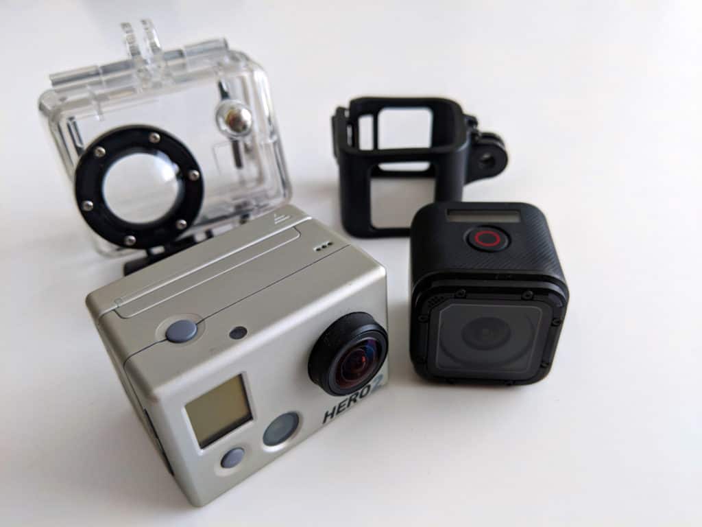 GoPro Session and GoPro Hero 2 with their protective covers